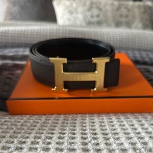 Black Leather Belt with Gold Buckle.